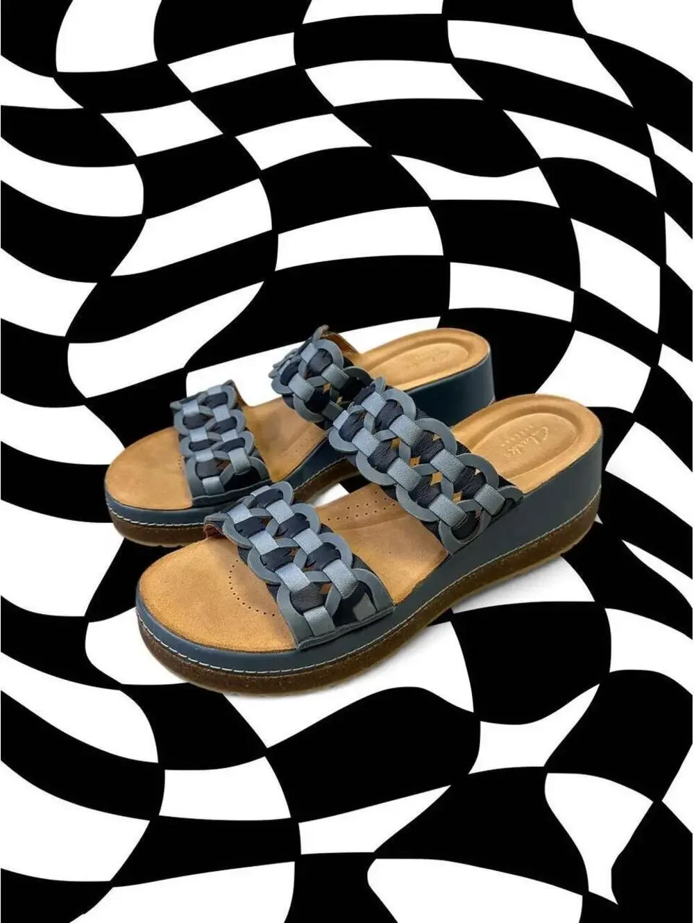 Clark’s blue leather sandals with woven strap detail
